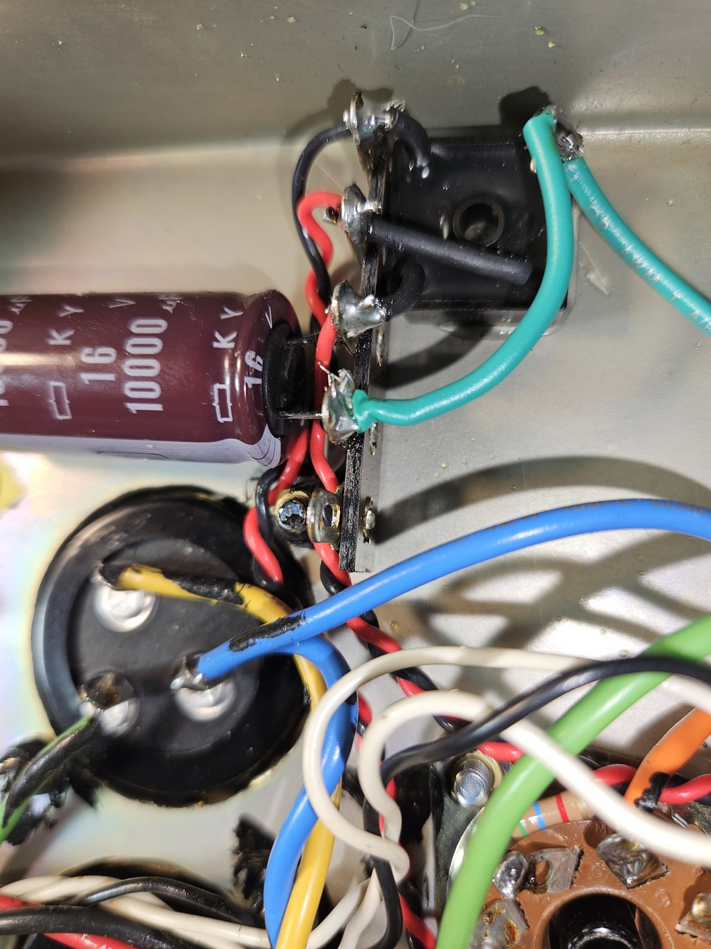 Wiring detail showing capacitor and rectifier connections